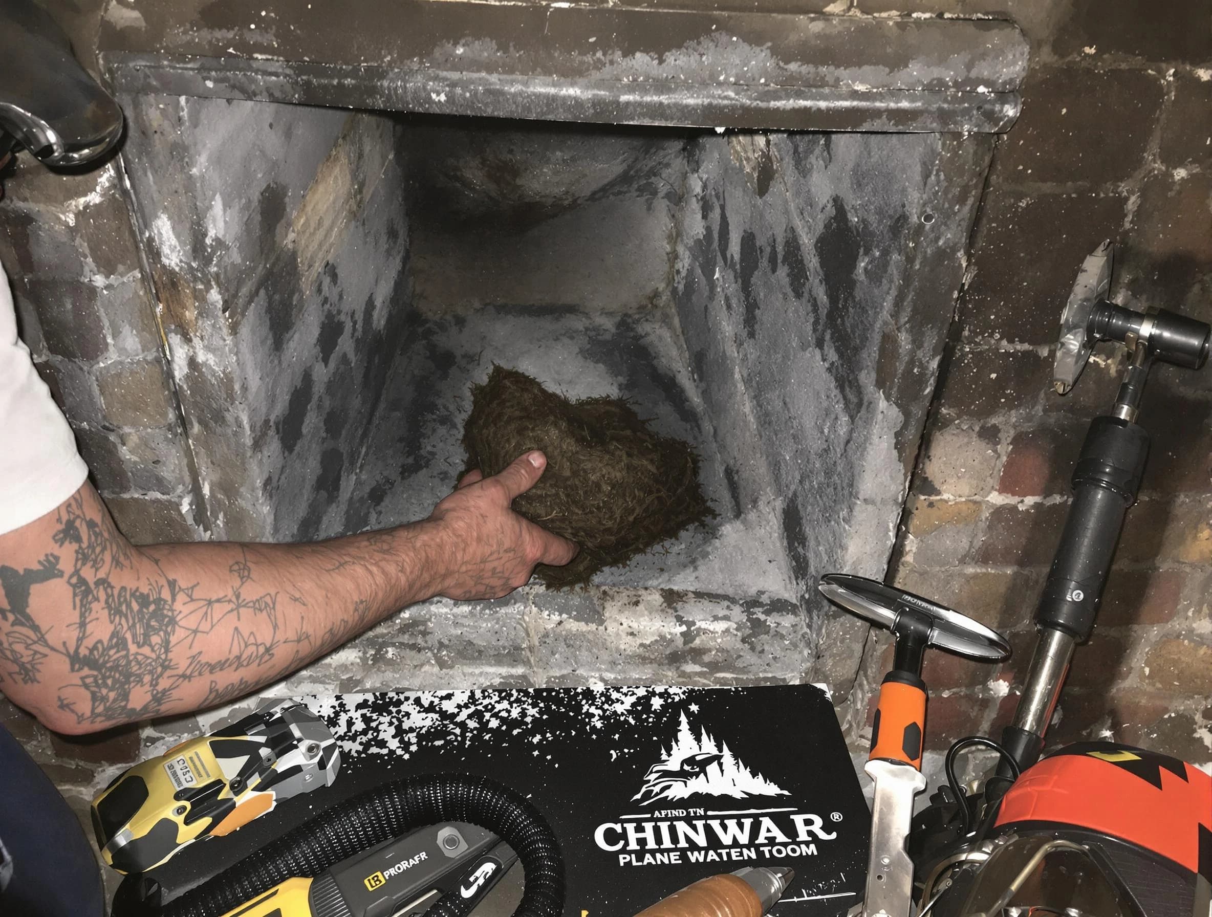 Millersville Chimney Sweep safely removing debris and screening chimney in Millersville, TN